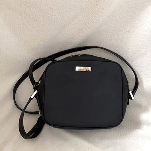 Kate Spade cross body purse.Good condition, only used a few times. 7.4”x4.9”